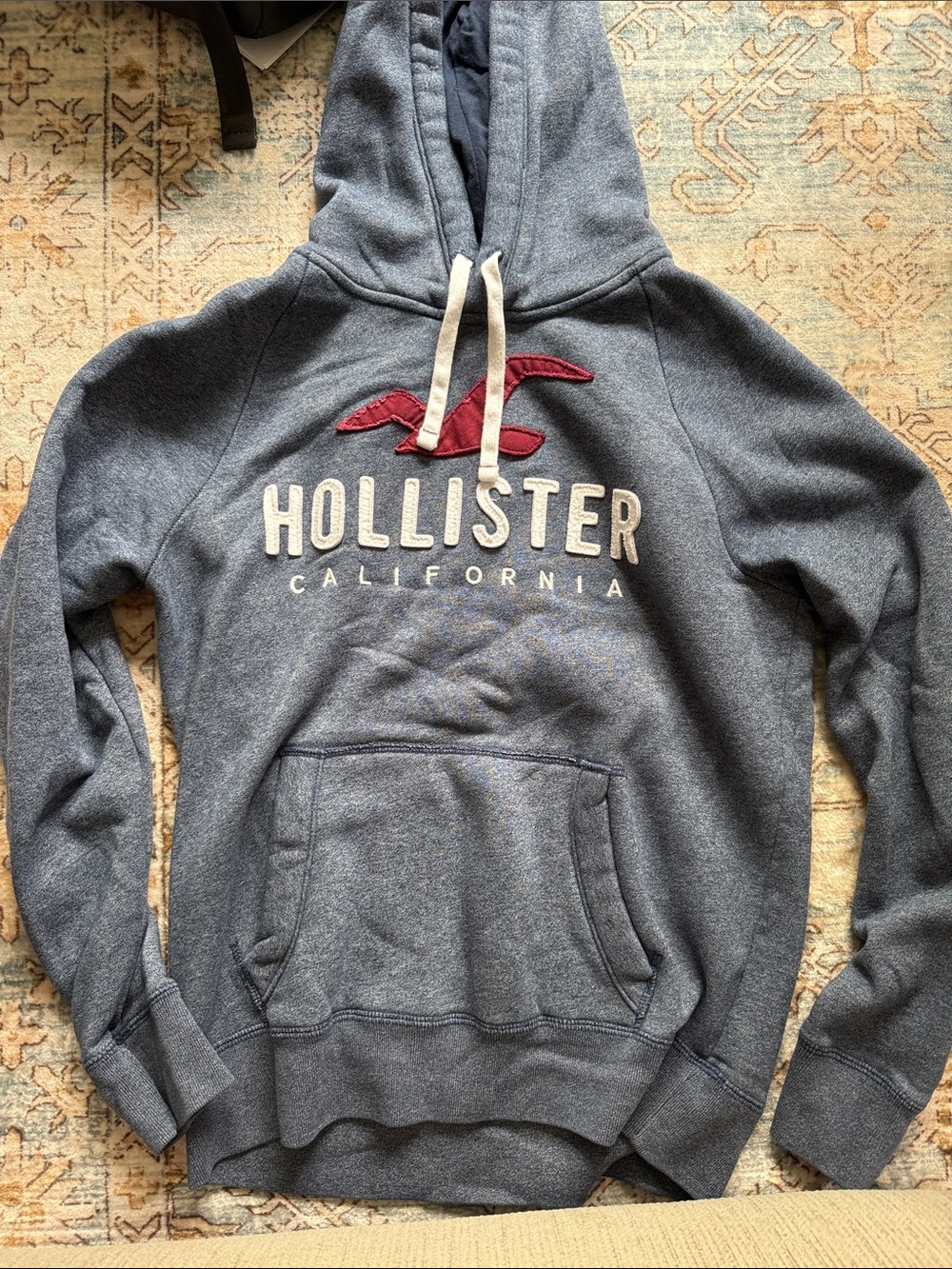 Hollister Men's Navy Blue Hoodie with Red Logo